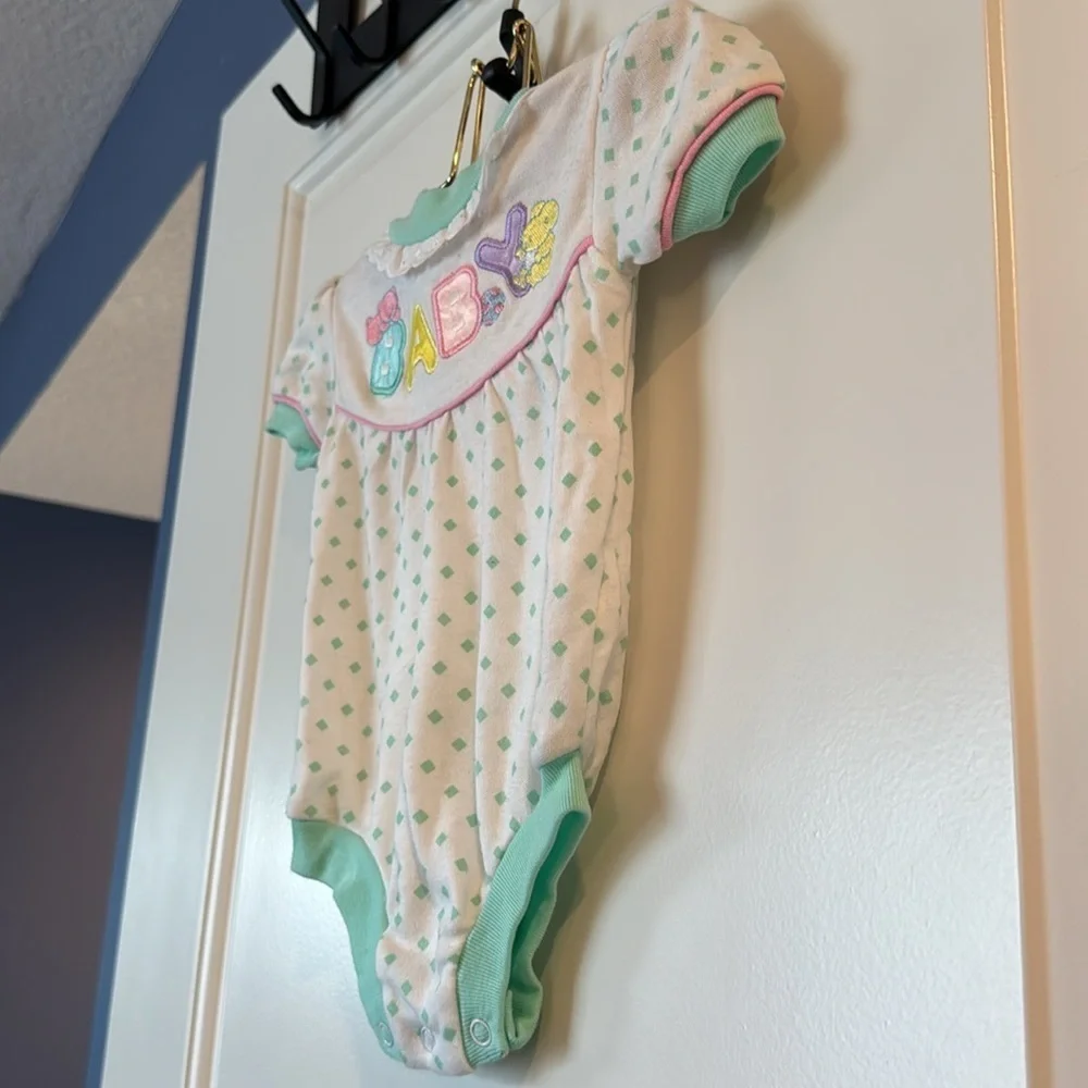 baby onesie w/ word BABY on front w/ pastel colors teal polka dot 6/9 months